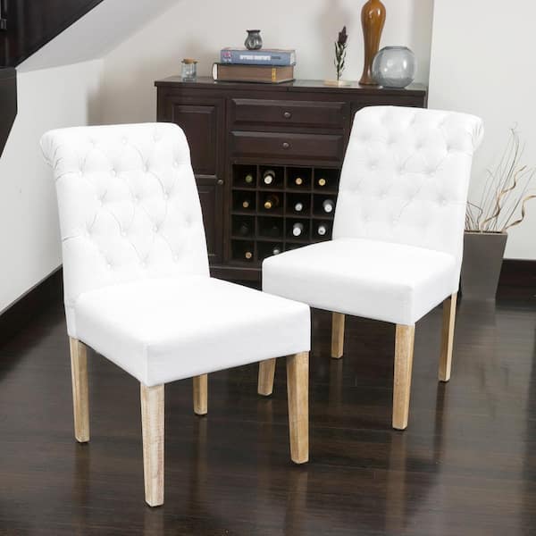 white tufted dining chairs