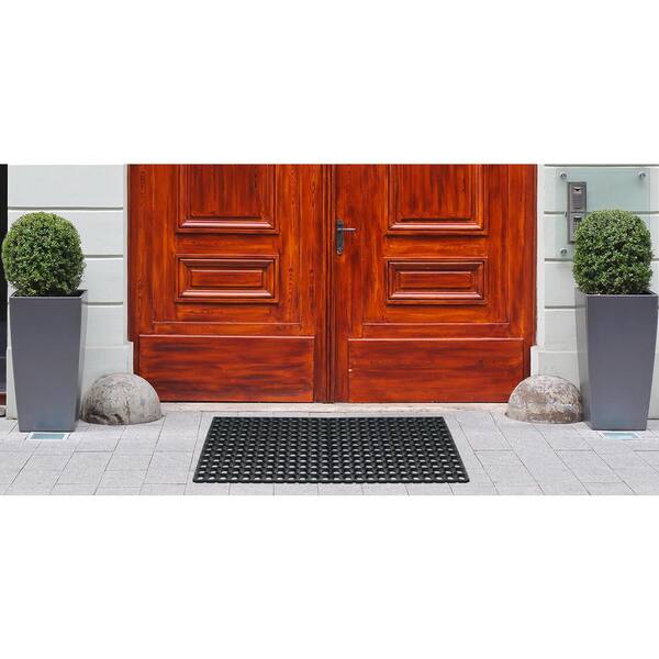 https://images.thdstatic.com/productImages/f848abb5-307c-4bc3-949c-8eabbcc3181a/svn/black-a1-home-collections-door-mats-a1home200136-76_600.jpg