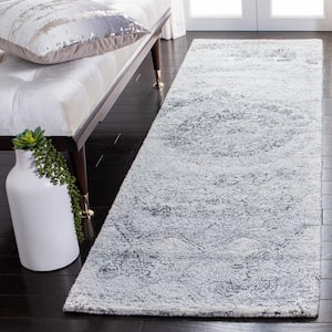 Abstract Ivory/Black 2 ft. x 12 ft. Distressed Medallion Runner Rug