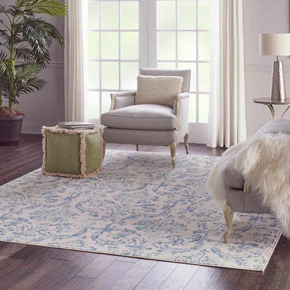 Elegant Ivory and Blue Damask 7' x 10' Synthetic Area Rug
