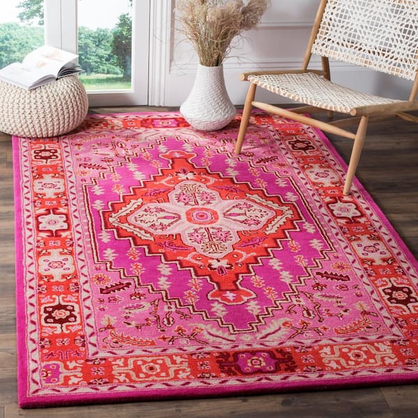 https://images.thdstatic.com/productImages/f86763f0-ab89-4a30-bb6c-4178e67417cf/svn/red-pink-safavieh-area-rugs-blg545b-7sq-e1_600.jpg
