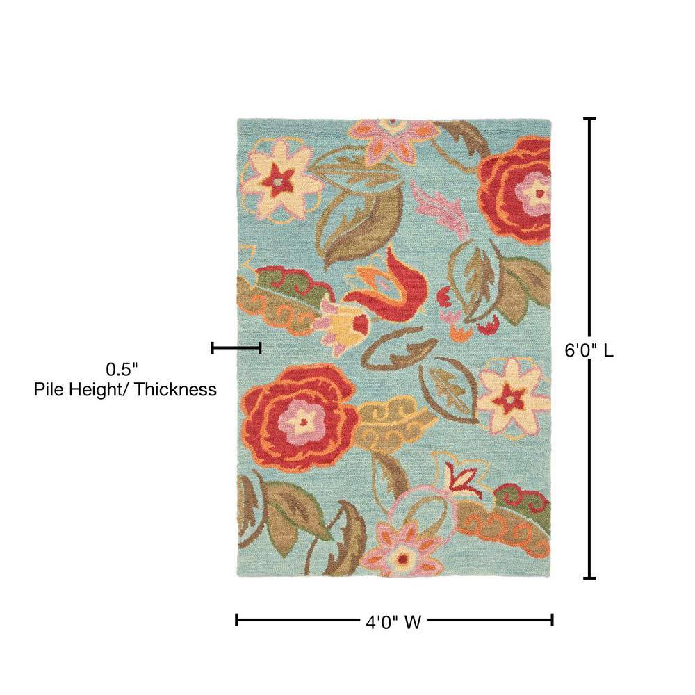 Handmade Blossom Flair Wool Rug 4' x 6' - Blue Floral