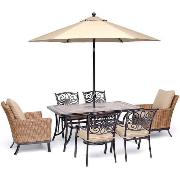 Hanover Monaco 7-Piece Aluminum Outdoor Dining Set with Tan Cushions 2 Woven, 4 Cast Dining Chairs, Table, Umbrella