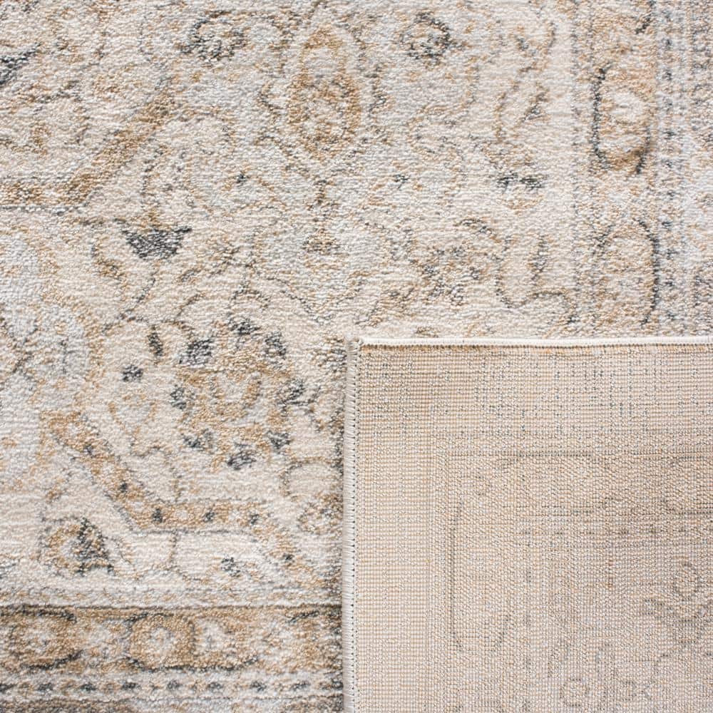 Isabella Blue and Cream 9' x 12' Synthetic Oriental Area Rug