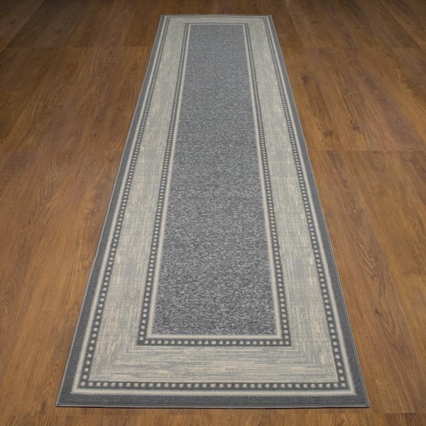 https://images.thdstatic.com/productImages/f8dbd7eb-bc94-4576-b565-7cd68e3ea27c/svn/2203-gray-ottomanson-area-rugs-oth2203-3x10-4f_600.jpg