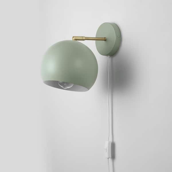 Green plug deals in wall sconce