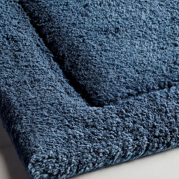 https://images.thdstatic.com/productImages/f8ffd67f-88ec-4137-8340-8e6f27db36e8/svn/forest-green-the-company-store-bathroom-rugs-bath-mats-vk75-17x24-for-grn-40_600.jpg