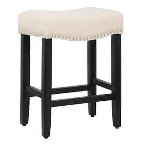 Jameson 24 in. Counter Height Black Wood Backless Nailhead Trim Barstool with Upholstered Beige Linen Saddle Seat