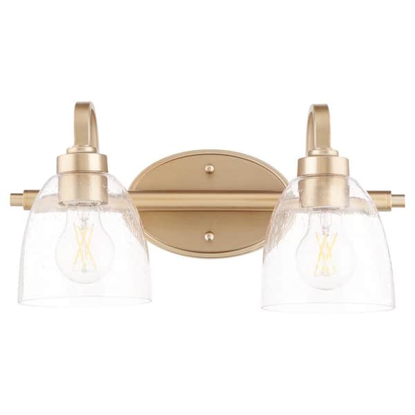 Quorum International Reyes 2-Light - 100-Watt Medium Lamp Base Light Vanity 16 in. Width with 2 Clear Glaass Diffusers Aged Brass