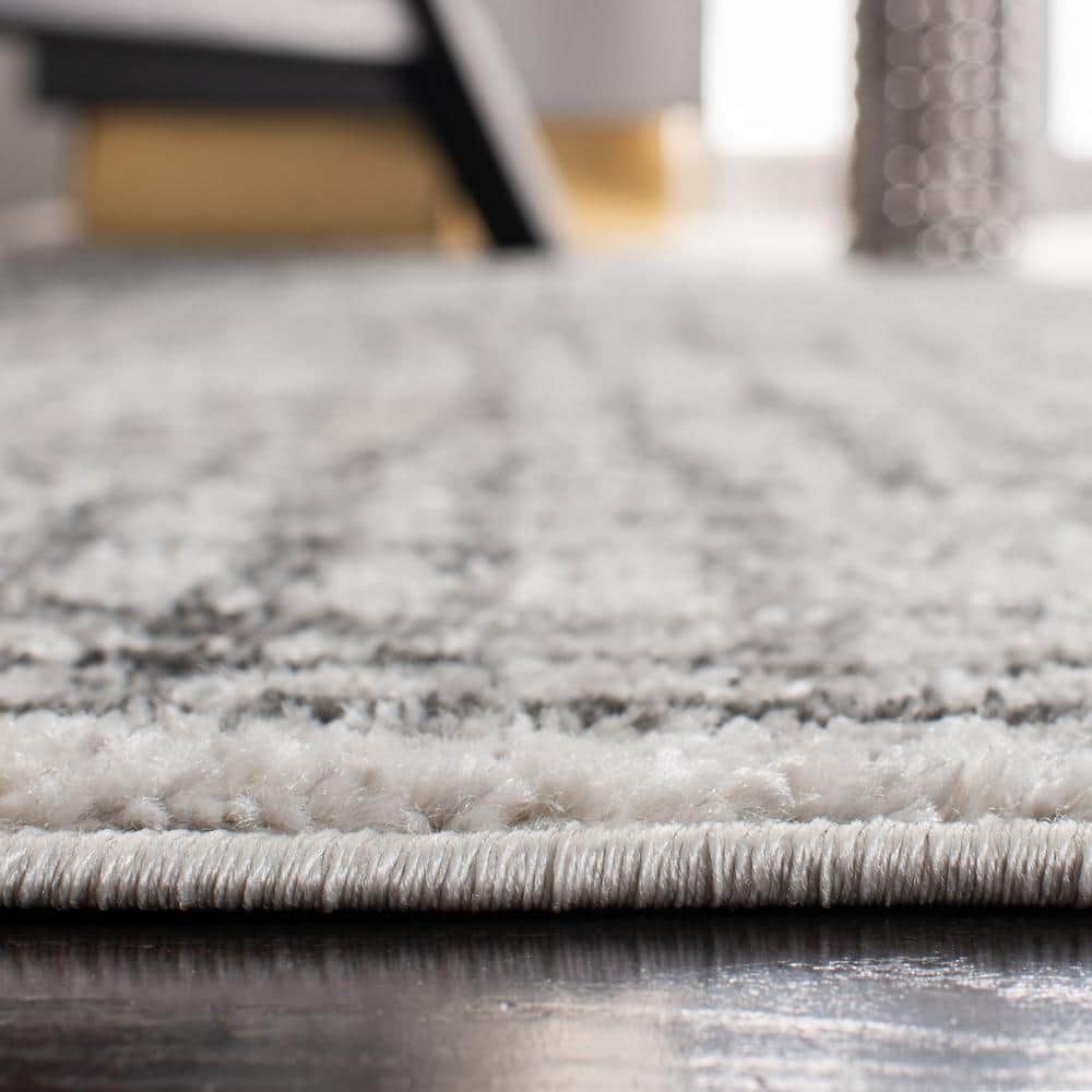 Ivory and Silver Rectangular Synthetic Area Rug, 4' x 6'