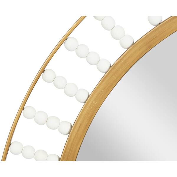 Cylindrical wood beads hand-sewn in a unique design over a metal frame.  Mirror comes with metal