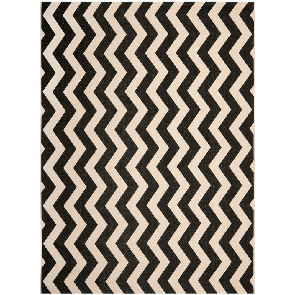 Courtyard Collection 54" Round Black/Beige Synthetic Area Rug