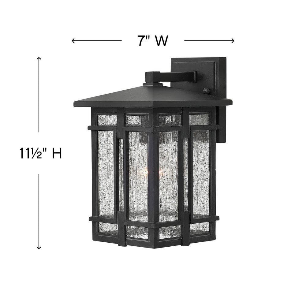 Tucker Museum Black Dimmable Outdoor Wall Sconce with Clear Seedy Glass