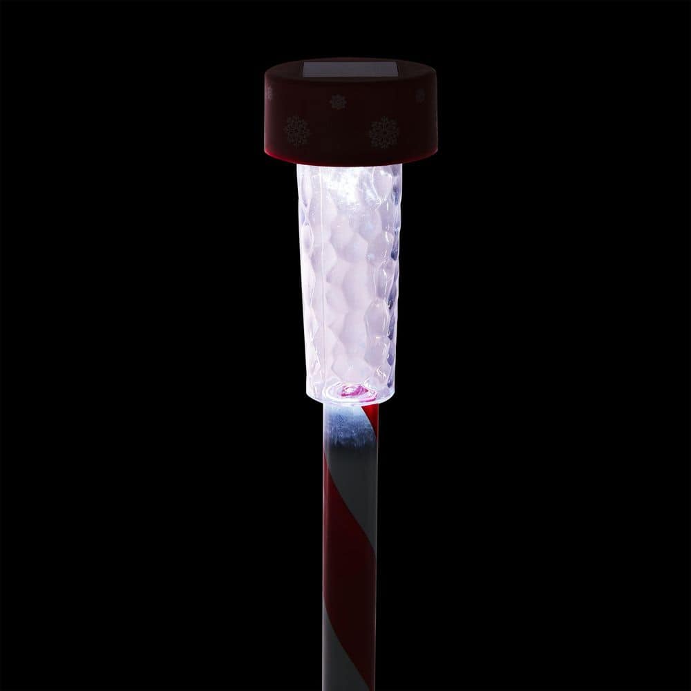 Alpine Corporation 27" Striped Plastic Solar Light-Up Holiday Garden Stakes, Set of 4, Red/White