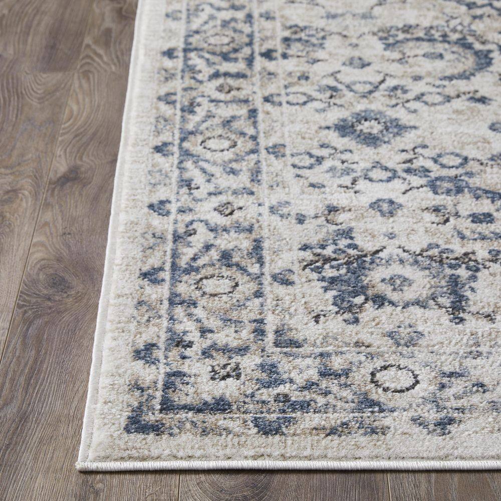 Cream and Blue Floral Border 6' x 9' Synthetic Area Rug