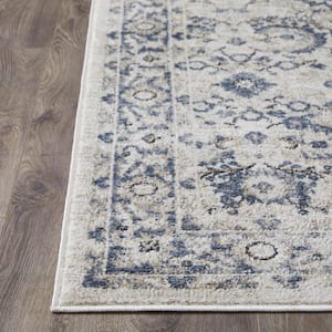 Kehleigh Otindas Cream 7 ft. 10 in. x 9 ft. 10 in. Oriental Polypropylene Indoor Area Rug