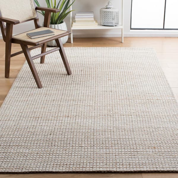 Natural Fiber Beige/Ivory 5 ft. x 8 ft. Solid Woven Area Rug