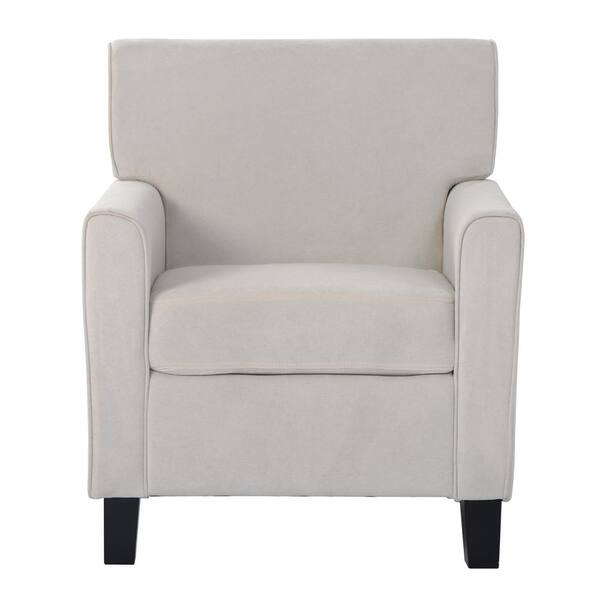 beige upholstered armchair