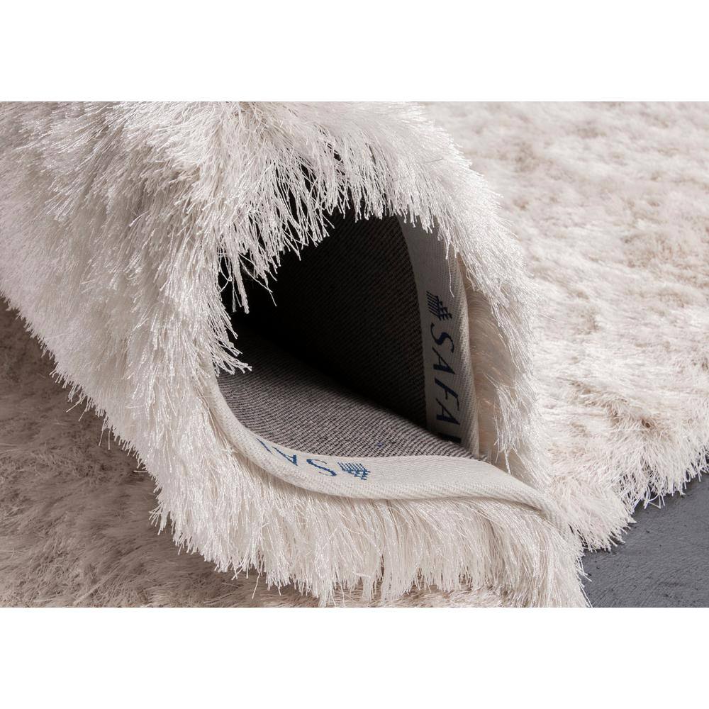 Ivory Tufted Shag 5' x 7' Wool and Synthetic Rug