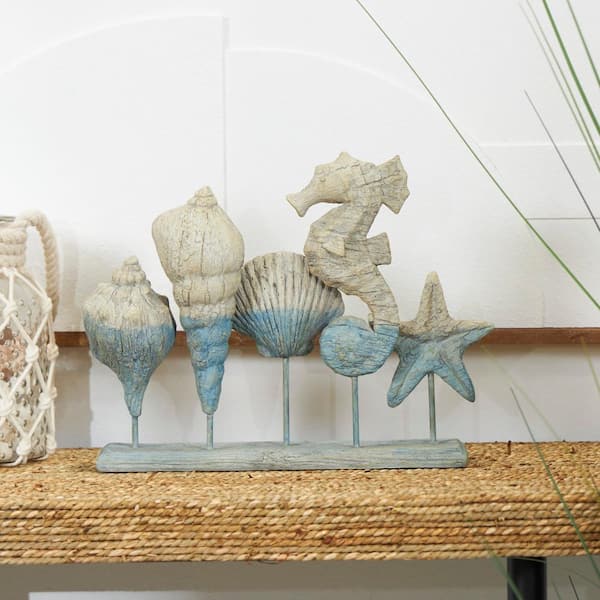 Litton Lane 11 in. Light Blue Polystone Textured Ombre Shell Sculpture with Seahorse Accent