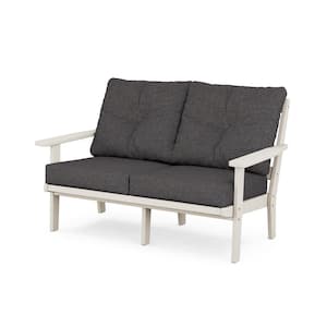 Prairie Deep Seating Plastic Outdoor Loveseat with in Sand/Ash Charcoal Cushions