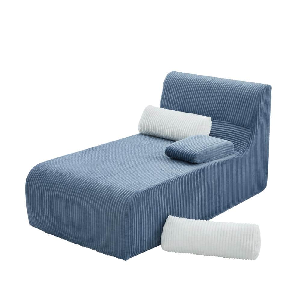 Side 3/4 view of a blue corduroy modular sofa section with pillows.