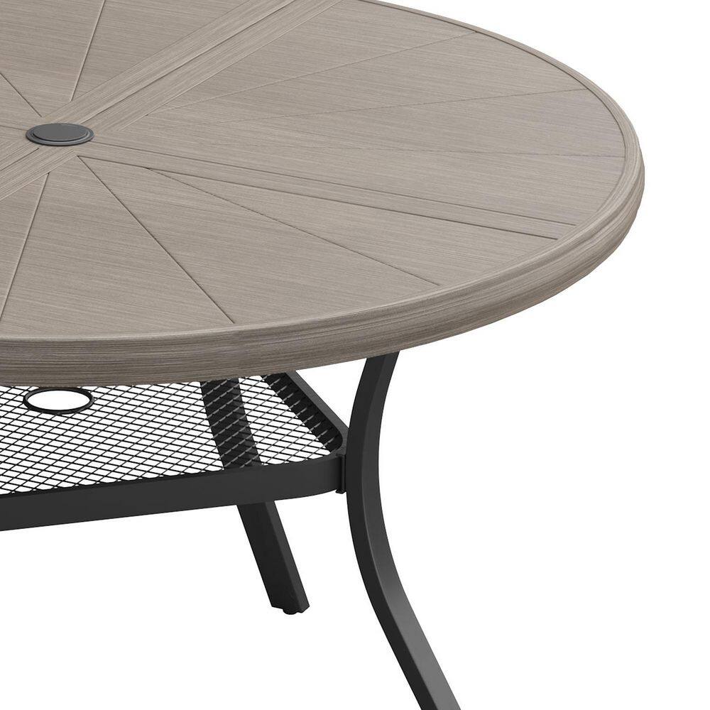 Round outdoor patio dining table with a wood-like top and black metal base.