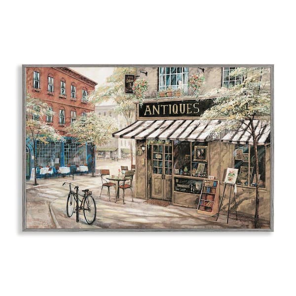 Stupell Industries Cozy Town Antiques Shop by Ruane Manning Gray Framed Architecture Giclee Art Print 16 in. x 24 in.