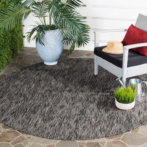 Courtyard Black/Black 9 ft. x 9 ft. Solid Color Diamond Indoor/Outdoor Round Area Rug