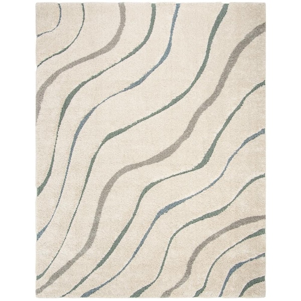 SAFAVIEH Florida Shag Cream/Light Blue 8 ft. x 10 ft. Solid Area Rug