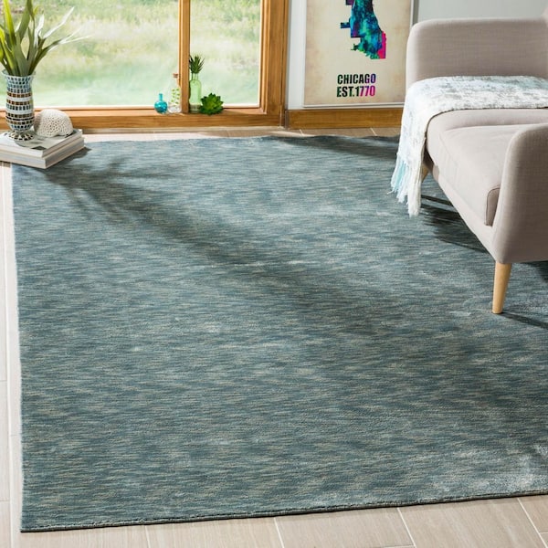 Mirage 6 ft. x 9 ft. Blue/Gray Solid Color Abstract Area Rug