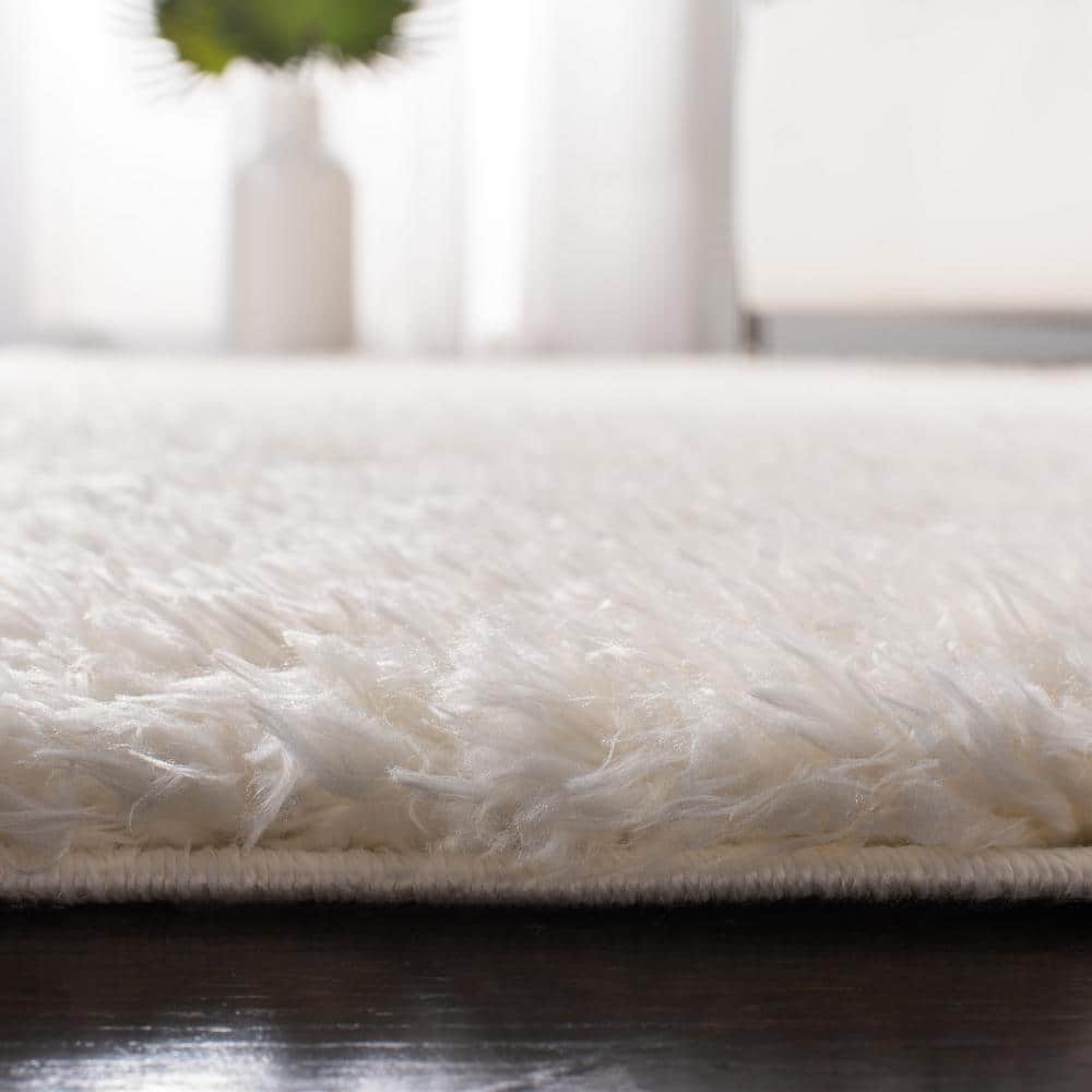 Ivory Solid Shag 8' x 10' Wool and Synthetic Area Rug