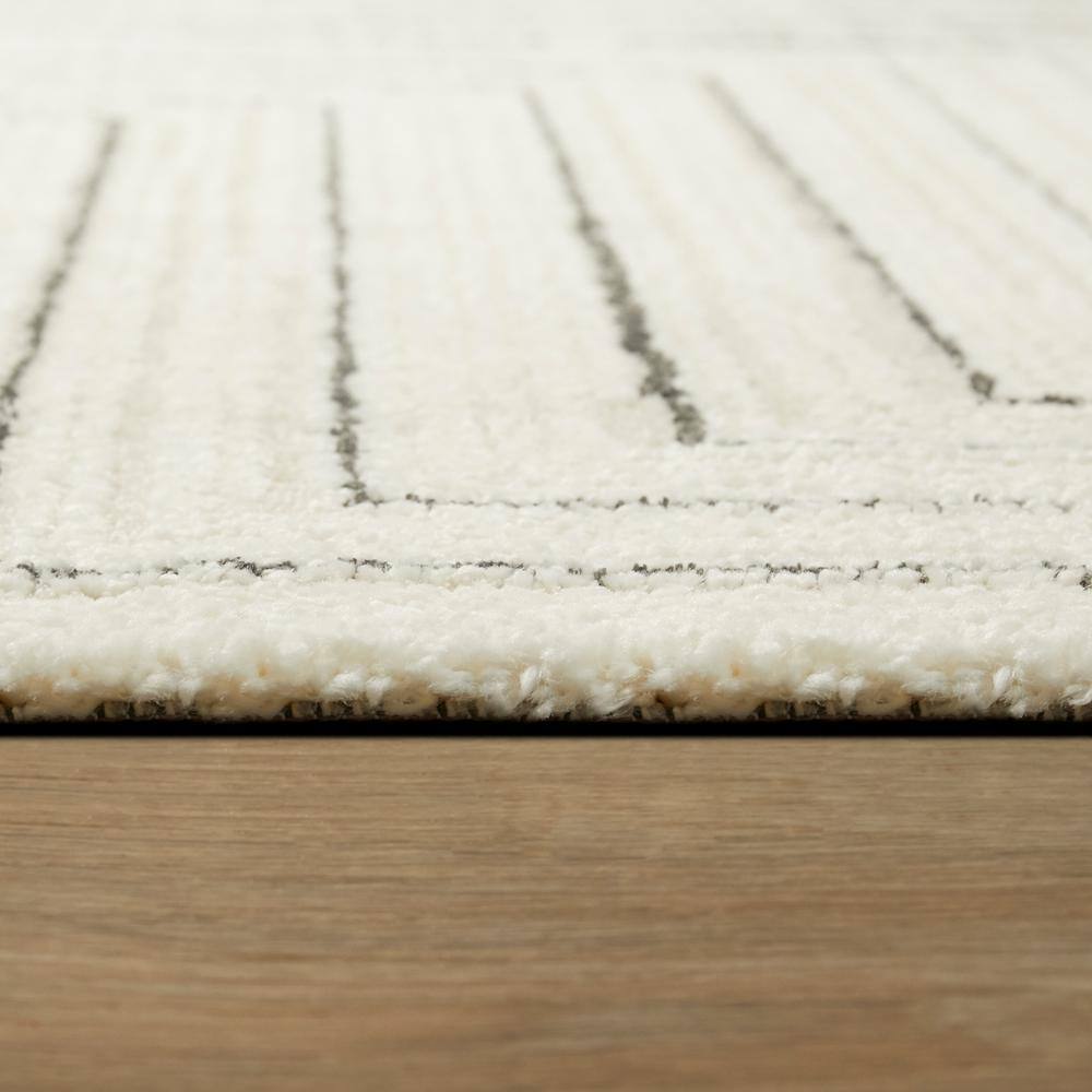 Luxurious Carmody Cream Geometric Synthetic Area Rug 5'3" x 7'