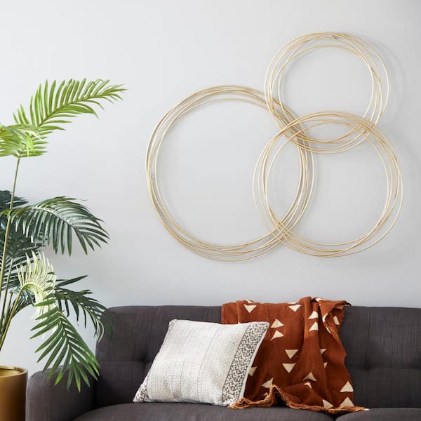36 in. x 44 in. Metal Gold Overlapping Ring Plate Wall Decor