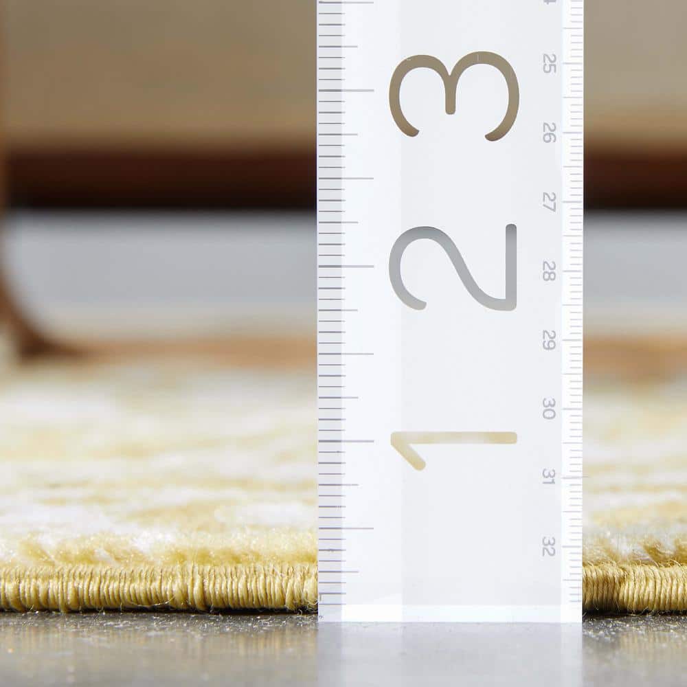 Gold 5' x 7' Synthetic Oriental Easy Care Rug