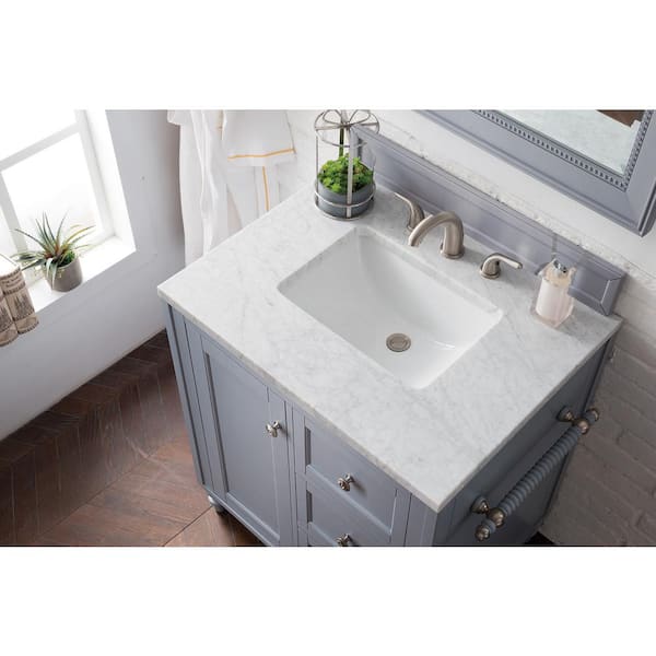 https://images.thdstatic.com/productImages/fa3b8ab3-b89d-4ea5-9c86-de0c5d9dd912/svn/james-martin-vanities-bathroom-vanities-with-tops-301v30sl3car-a0_600.jpg