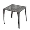Close-up of geometric pattern on the metal coffee table top.