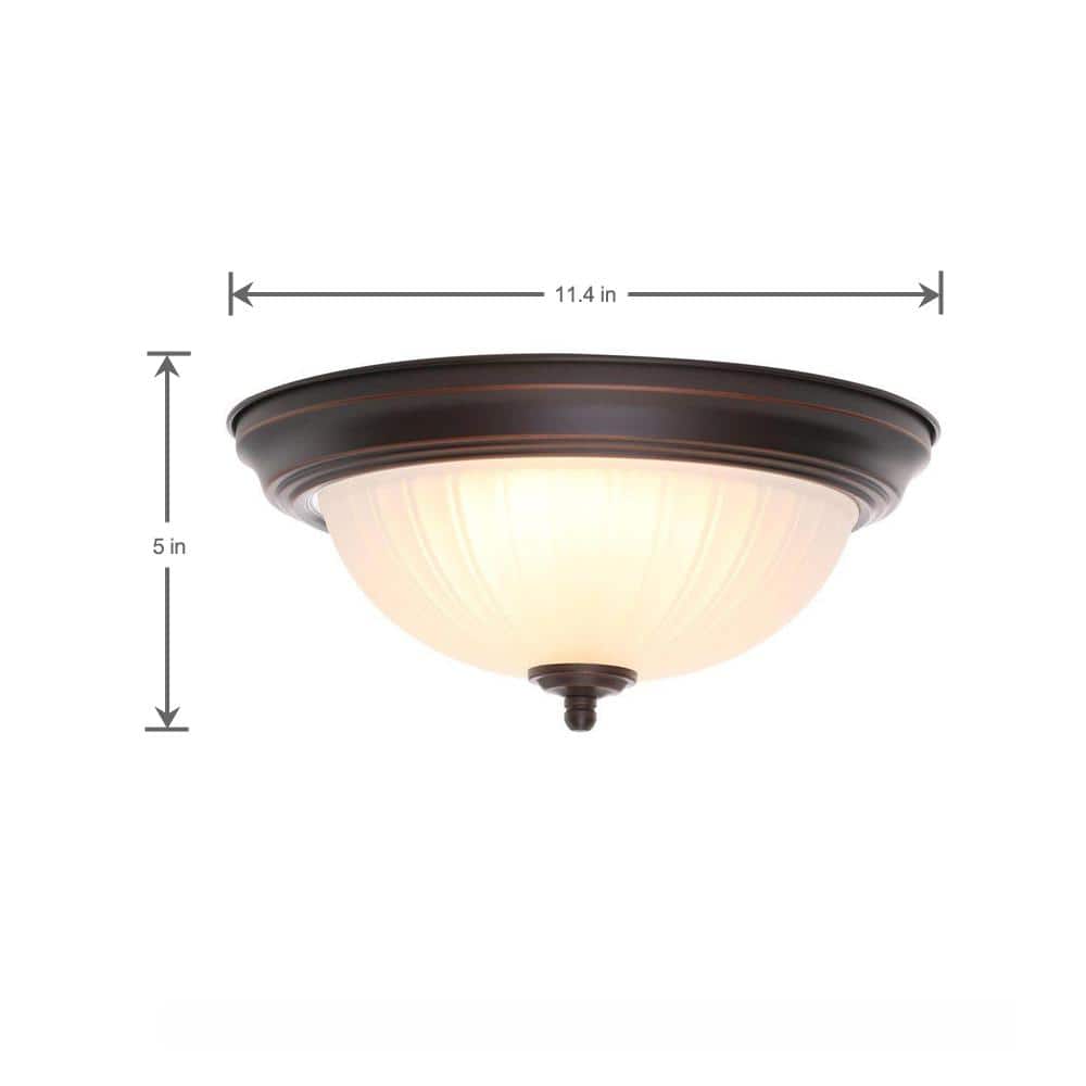 Traditional Globe LED Flushmount in Oil Rubbed Bronze with Frosted Glass