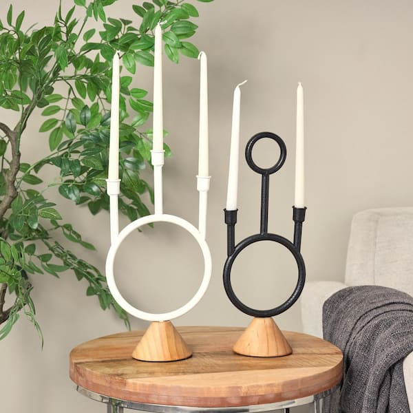Litton Lane Black Metal Abstract Circular Ring Candle Holder with Wooden Cone Bases (Set of 2)