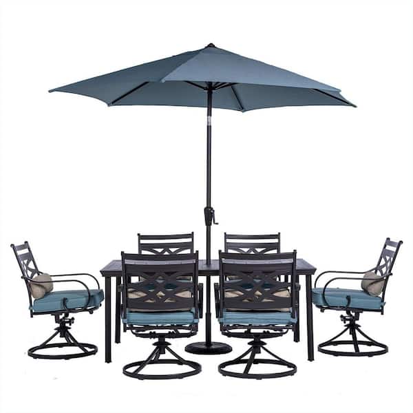 Hanover Montclair 7-Piece Steel Outdoor Dining Set with Ocean Blue Cushions, 6 Swivel Rockers, 40x66 in. Table and Umbrella