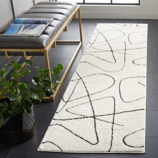 Melody 2 ft. x 16 ft. Ivory/Black Abstract Linear Runner Rug