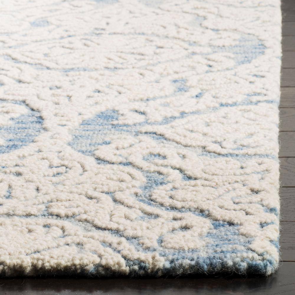 Handmade Tufted Blue/Ivory Floral Wool Area Rug