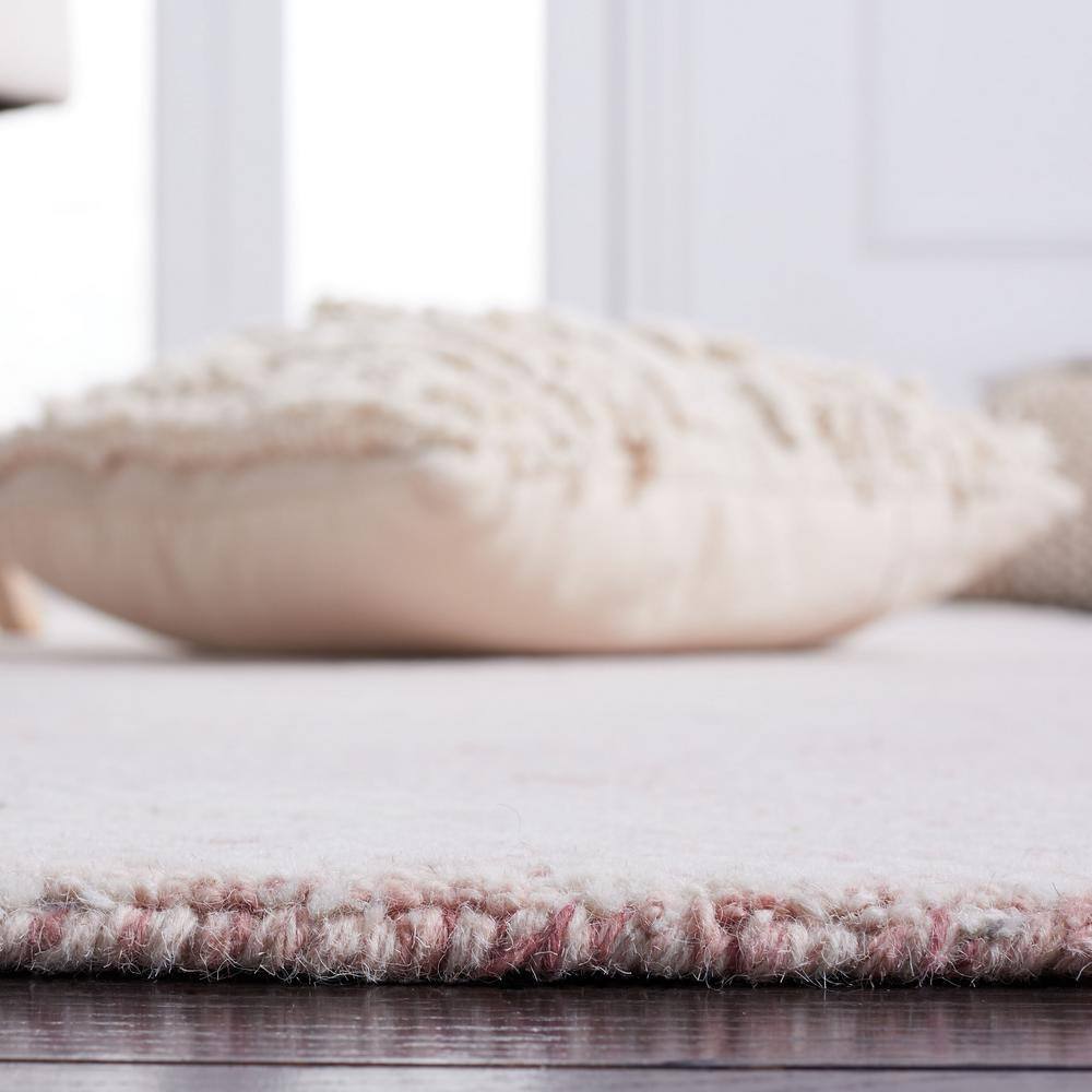 Ivory Floral 8' x 10' Handmade Wool Tufted Area Rug