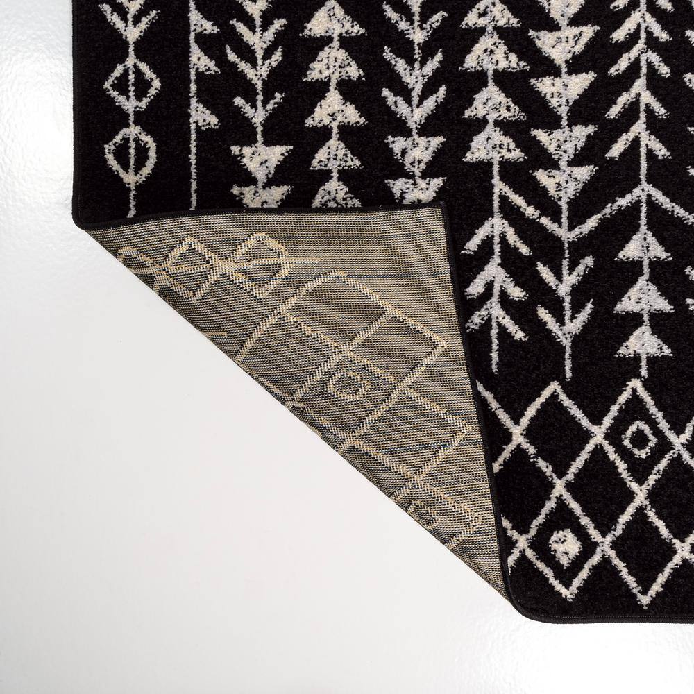 3' x 5' Black and Cream Synthetic Moroccan Geometric Area Rug