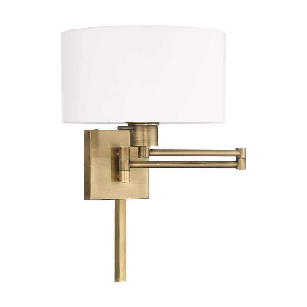 Antique Brass Swing Arm Wall Lamp with Off-White Fabric Shade