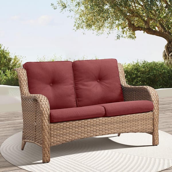 Yellow PE Wicker Outdoor Loveseat with Red Cushions and Curved Armrests