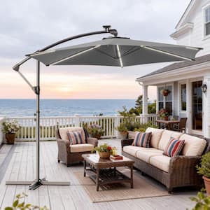 cheapest-priced quality 10 outdoor patio umbrella JOYESERY 10 ft. Solar Patio Umbrella with 6-LED Strips, Secure Lock and  Raised Base Pole, Stable Outdoor Umbrella in Lake Blue J-UM-LED985-LB