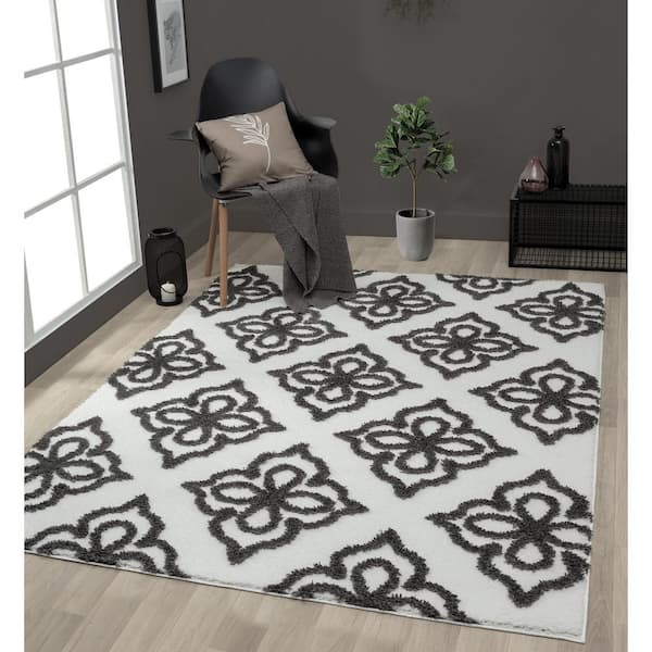 https://images.thdstatic.com/productImages/fafef6c4-db43-4baa-9f9f-38e32e776f2a/svn/charcoal-united-weavers-area-rugs-2615-30277-1013-e1_600.jpg