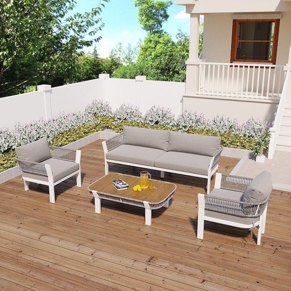 Harper & Bright Designs 4-Piece Metal and Brown PP Rope Outdoor Patio Conversation Set with Brown Gray Cushions and Coffee Table