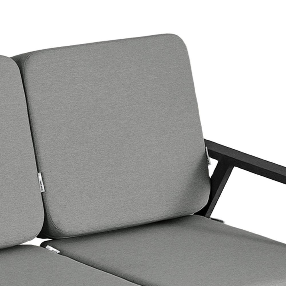 Close-up detail of the backrest and frame of an outdoor sofa.